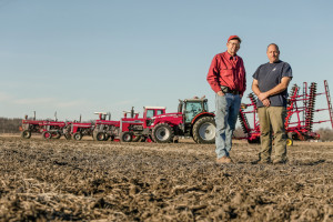 Bob and Darren Littleton with their full line of AGCO equipment.