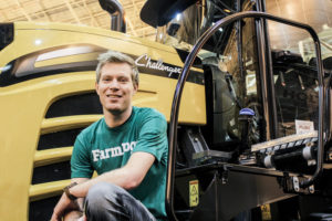 Vollmar is seen here with a Challenger tractor similar to one used on his family’s Michigan farm.