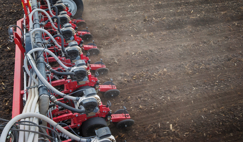 A White Planters 9800VE planting seed accurately at high speeds.